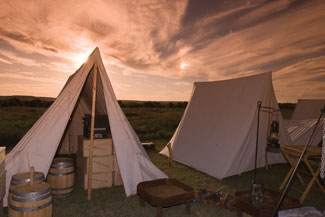 Soldiers' tents at dusk.