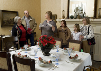 A group touring the dining room.