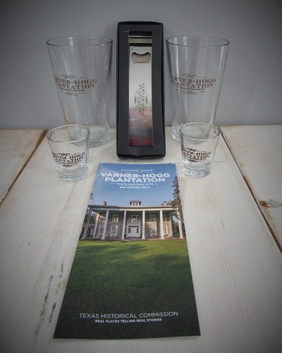 Two pint glasses, bottle opener, toothpick holders, site guide