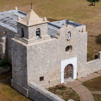 An aerial view of a stone building