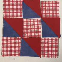 Red plaid squares with solid red and blue triangles made into squares